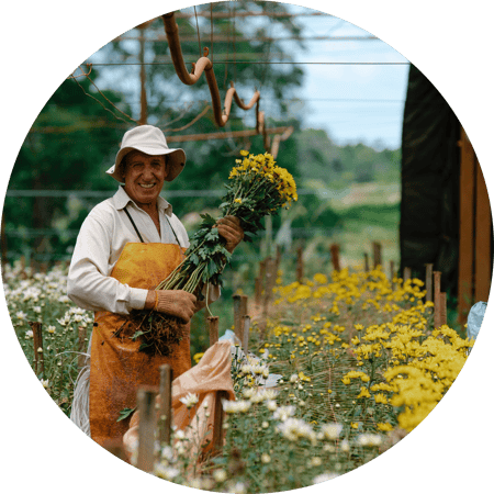Man holding a bouquet of wild flowers